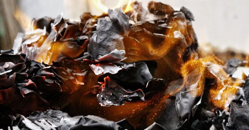 close up of burning trash.