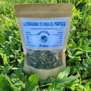 bag of The Nurturer Postpartum Tea outside in grass